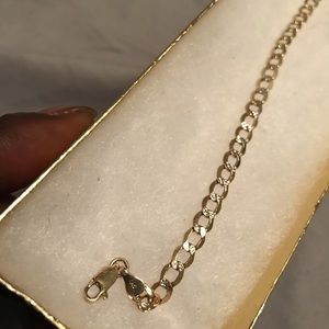 10k gold Cuban link bracelet with white gold cuts